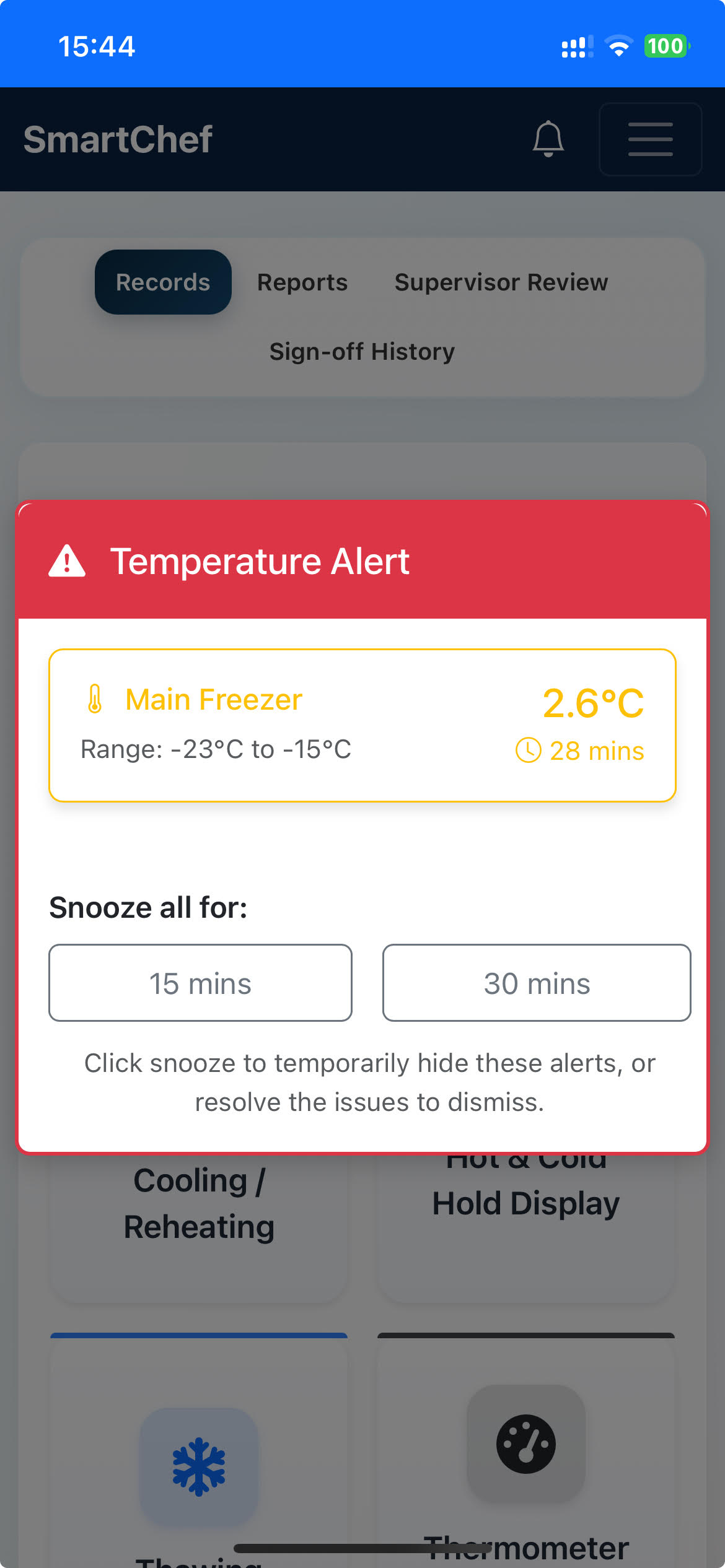 SmartChef mobile app displaying freezer temperature breach alert with snooze and acknowledge options