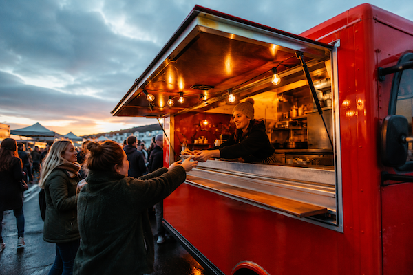 Food truck serving customers at an Irish market