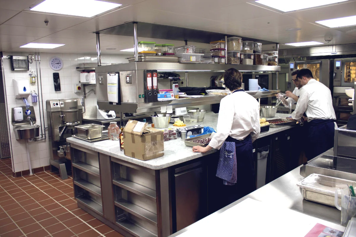 Staff working in a professional hotel kitchen